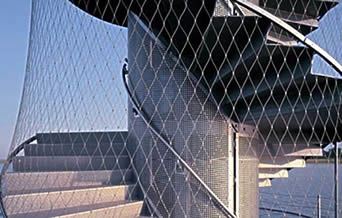 Ferrule type stainless steel cable mesh is mounted to outer frame of stairwell as a guidance.